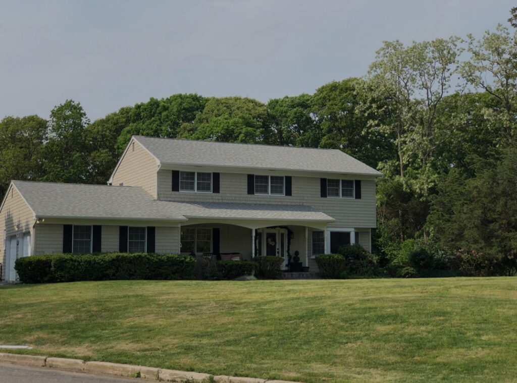 The New Image G.C. Roofing team on a completed residential project